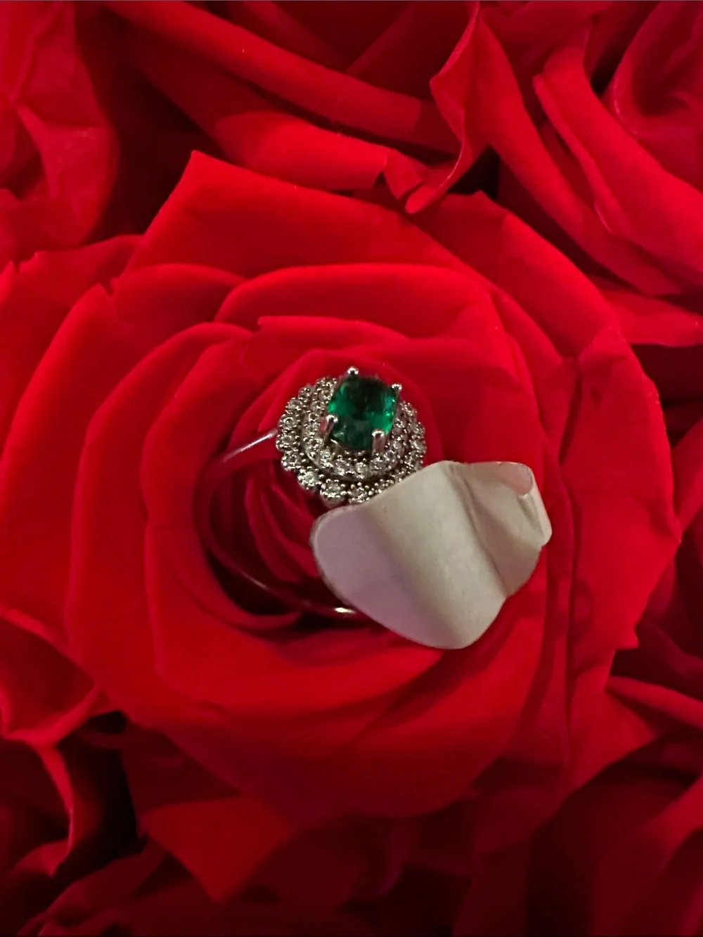 Emerald Green Halo Ring with Clear Accent Stones